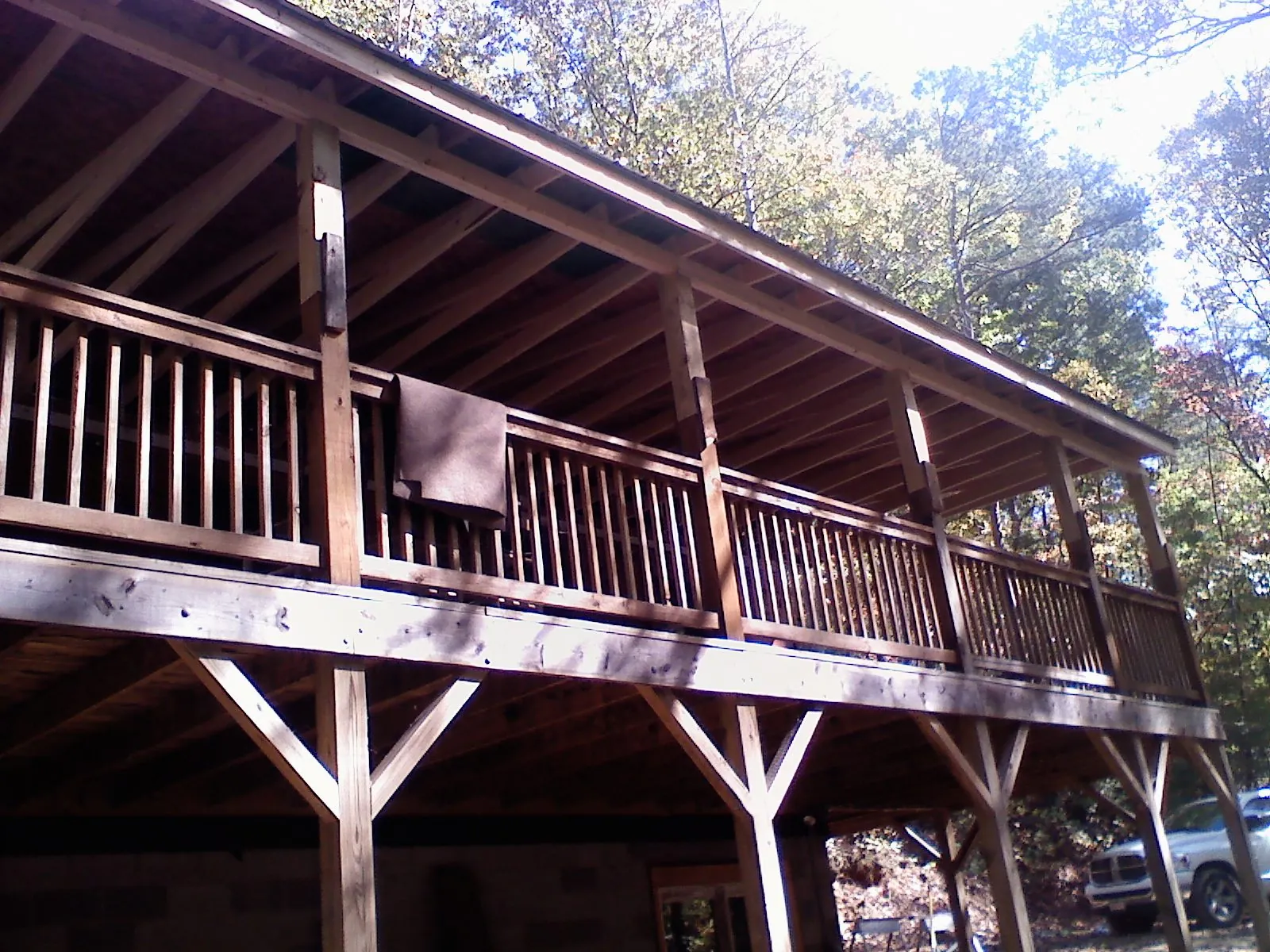 Timber framing under a new elevated porch and deck — Roof Leak Repair in Plaistow by Roofing Brothers